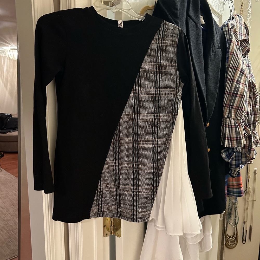 Unique boutique sweater. Different patterns.